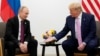 US President Donald Trump gestures during a meeting with Russian President Vladimir Putin at a G20 leaders summit in June 2019.