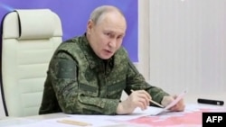 When visiting troops in Kursk, Putin wore military fatigues, something he does rarely.